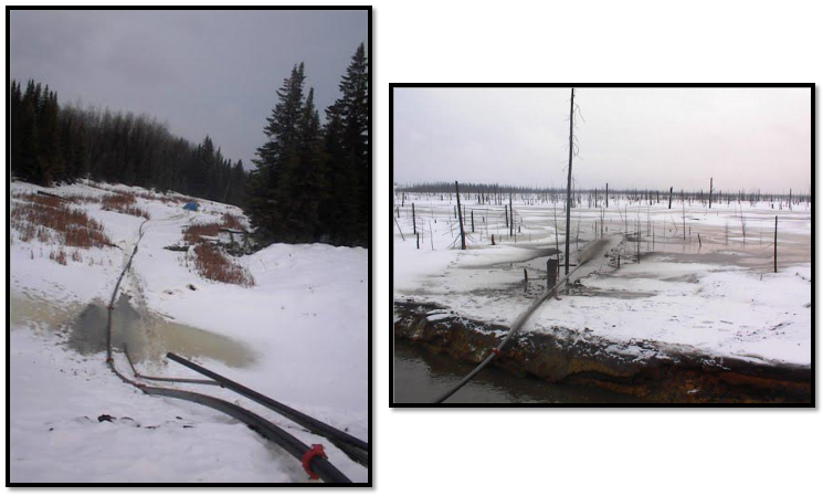 winter scene showing hose configuration for discharge of tailings