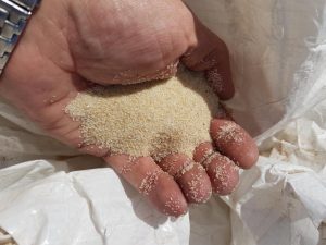 small amount of silica sand from a sand pumping project at a nuclear facility 