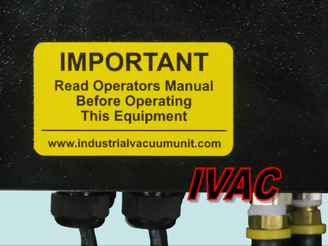 industrial vacuum control panel with warning decal